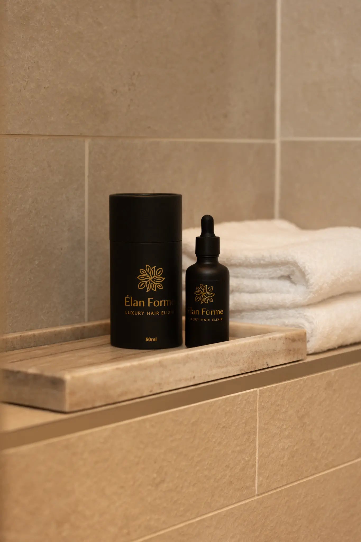 Élan Forme products on bathroom shelf